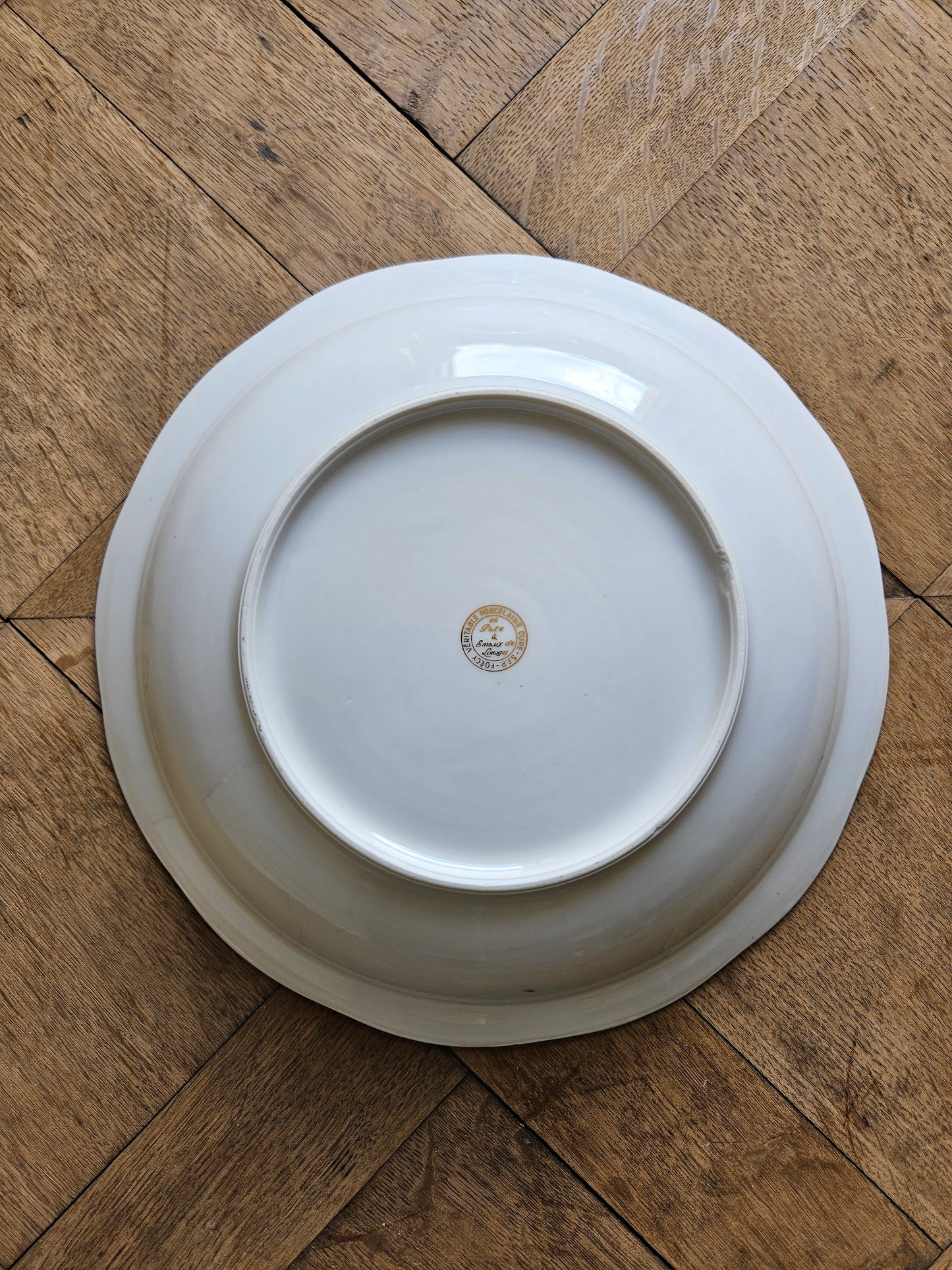 Plat creux ancien porcelaine S.F.P Foëcy
