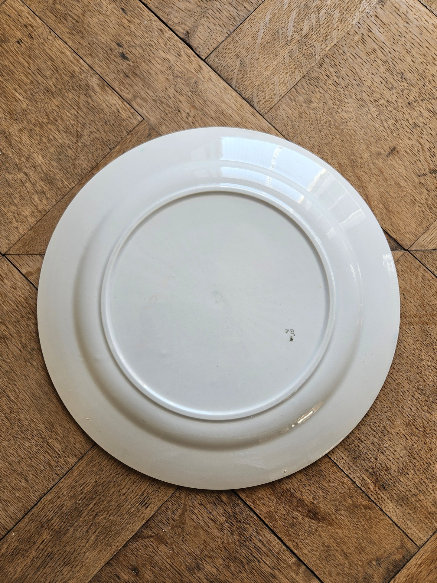 Plat rond rétro Badonviller décor rayé rouge