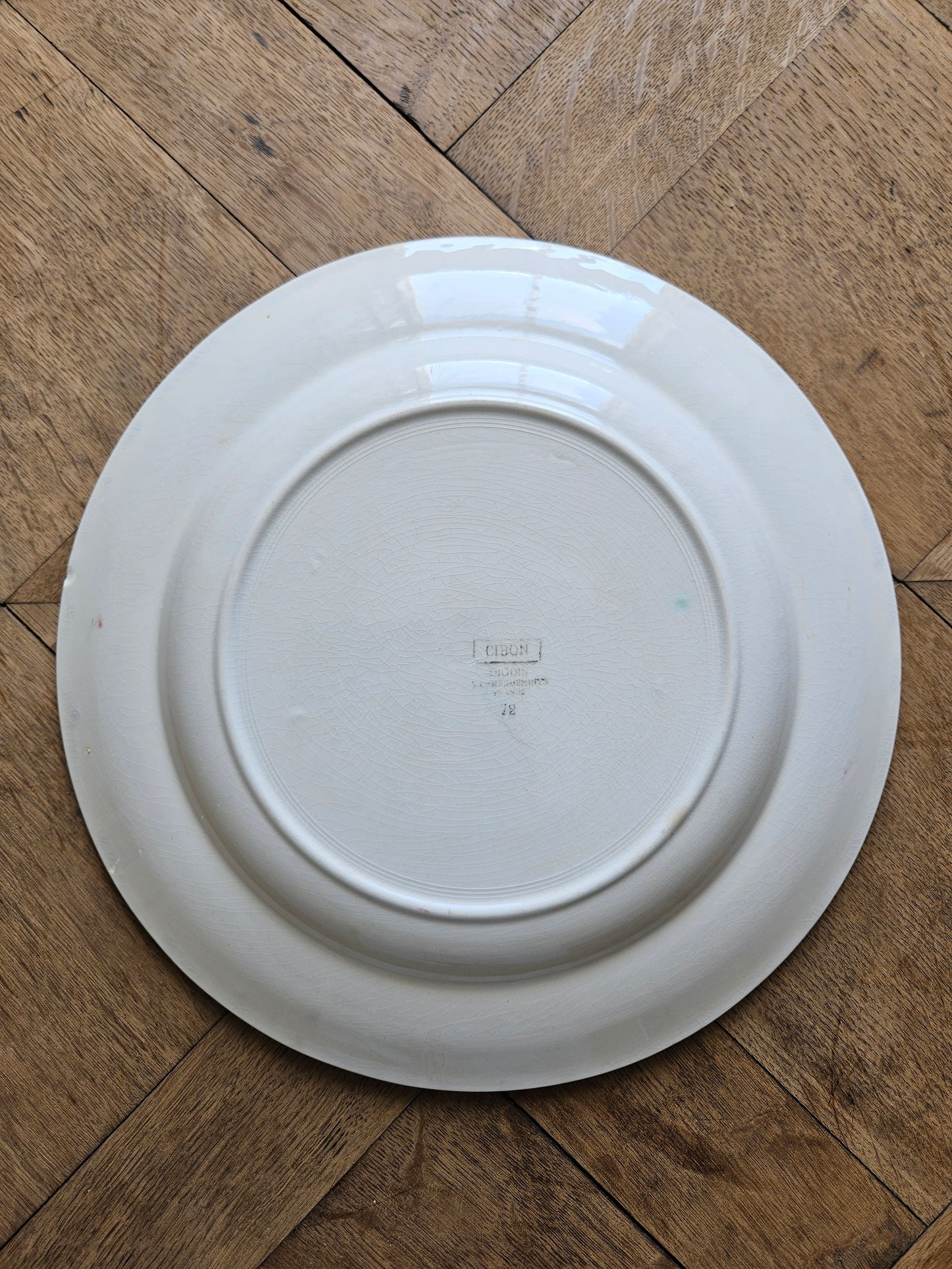 Arriere du plat rond ancien Digoin, modèle Cibon