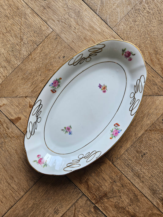 Ravier ancien en porcelaine de Châtres-sur-Cher au décor fleuri 