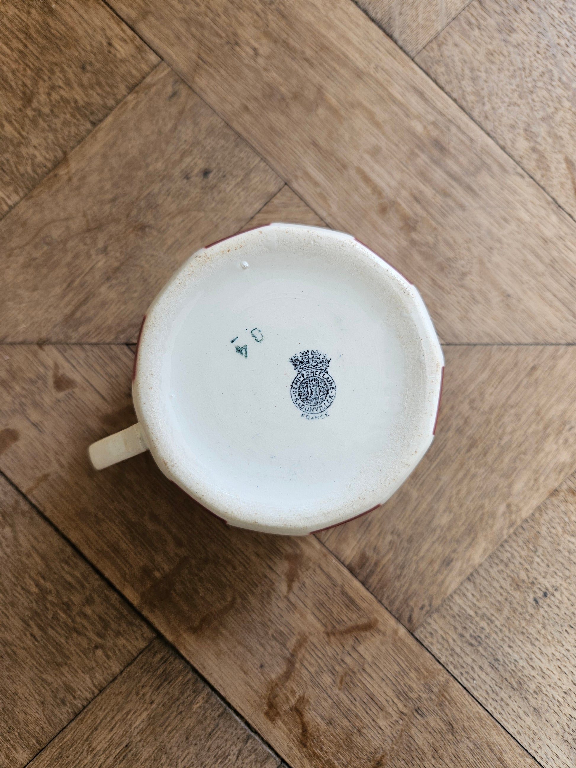 Tasse ancienne estampillée Badonviller demi porcelaine.
