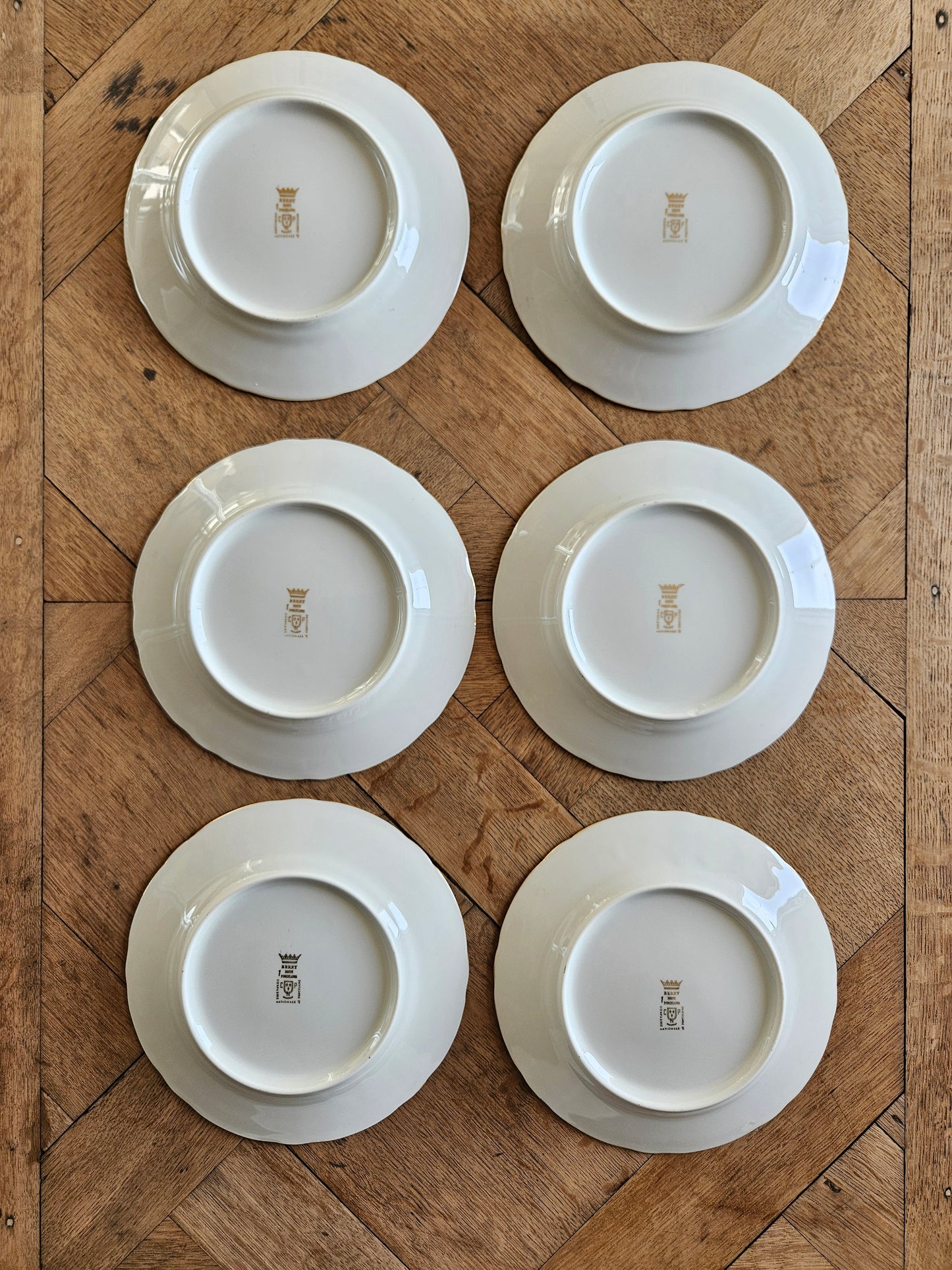 Lot de 6 assiettes à dessert anciennes estampillées Compagnie Nationale de Porcelaine 
