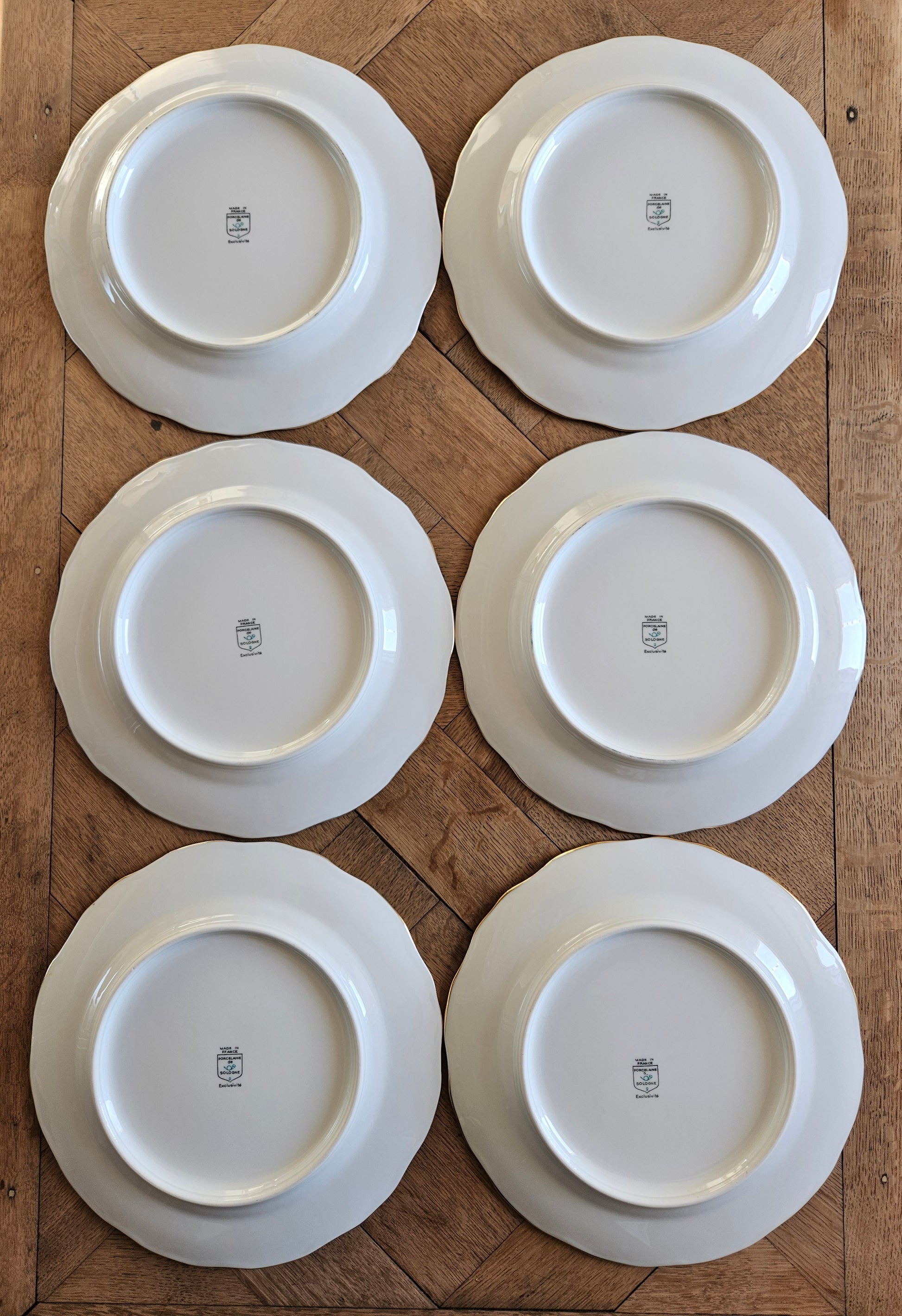 Assiettes vintage estampillées porcelaine de Sologne