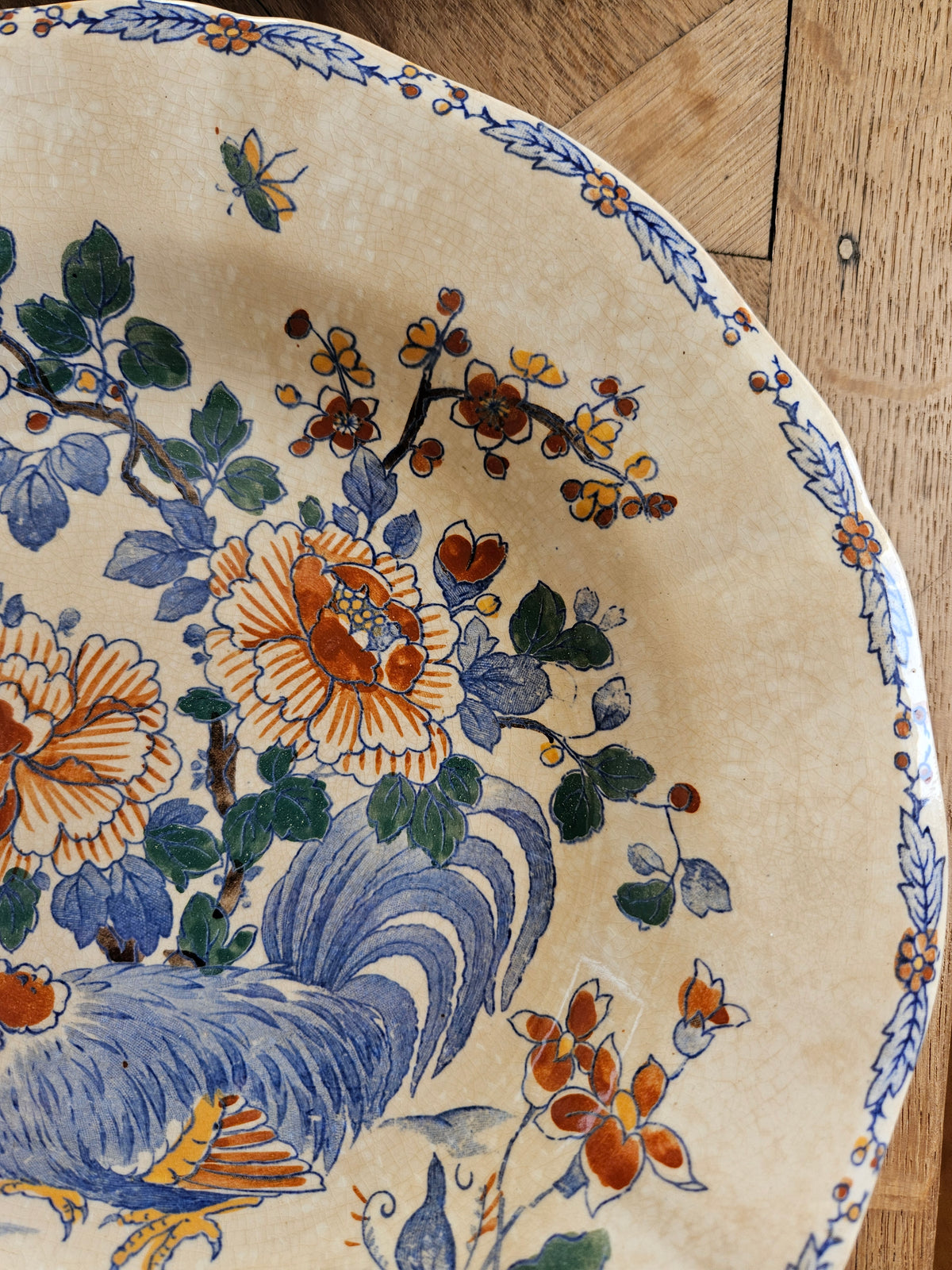 Assiettes creuses Gien, coq et pivoines (défauts)