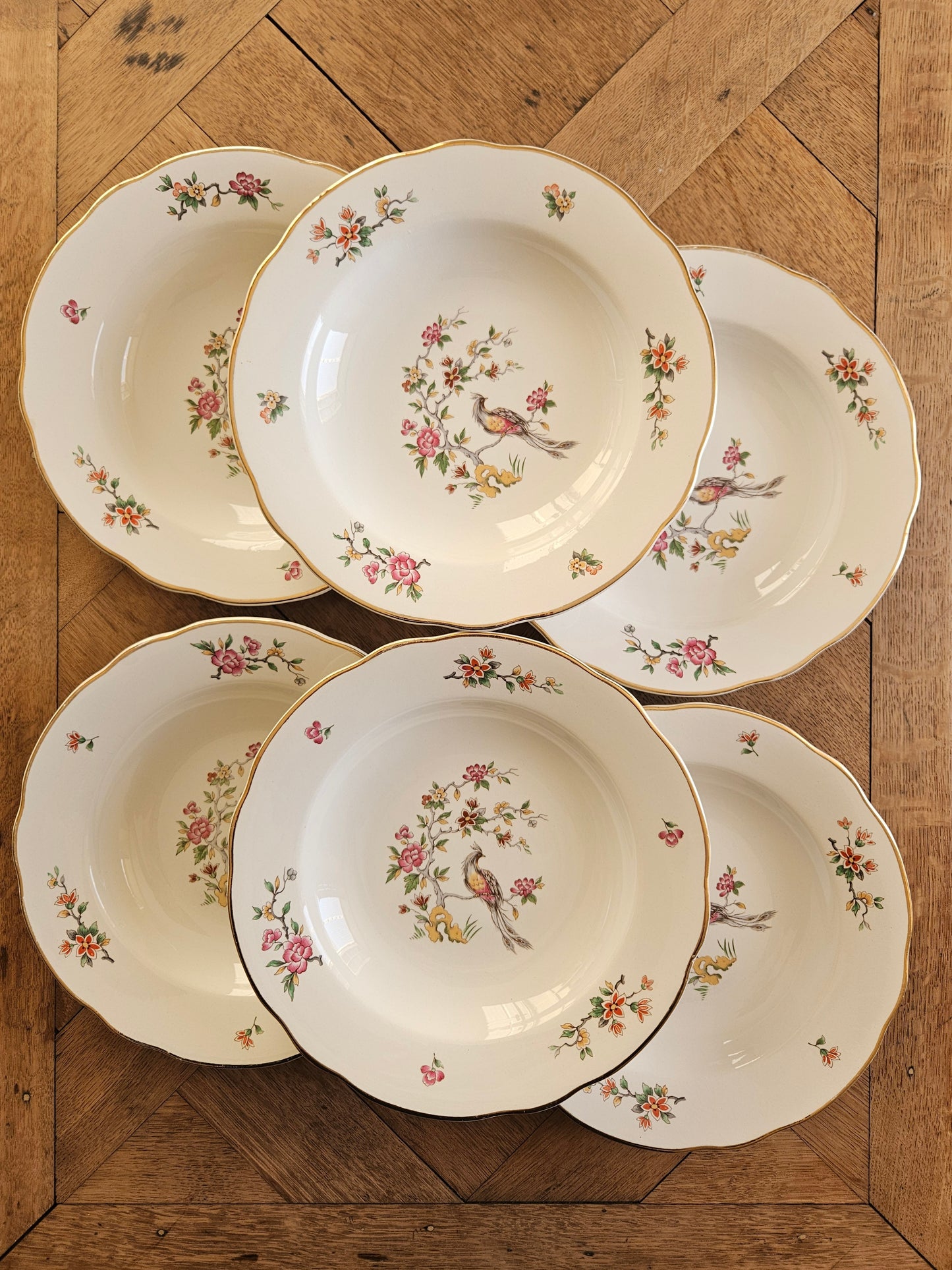 Lot de 6 assiettes creuses vintage Digoin. Modèle Condé.
Décor d’oiseau et d’arbre en fleurs.