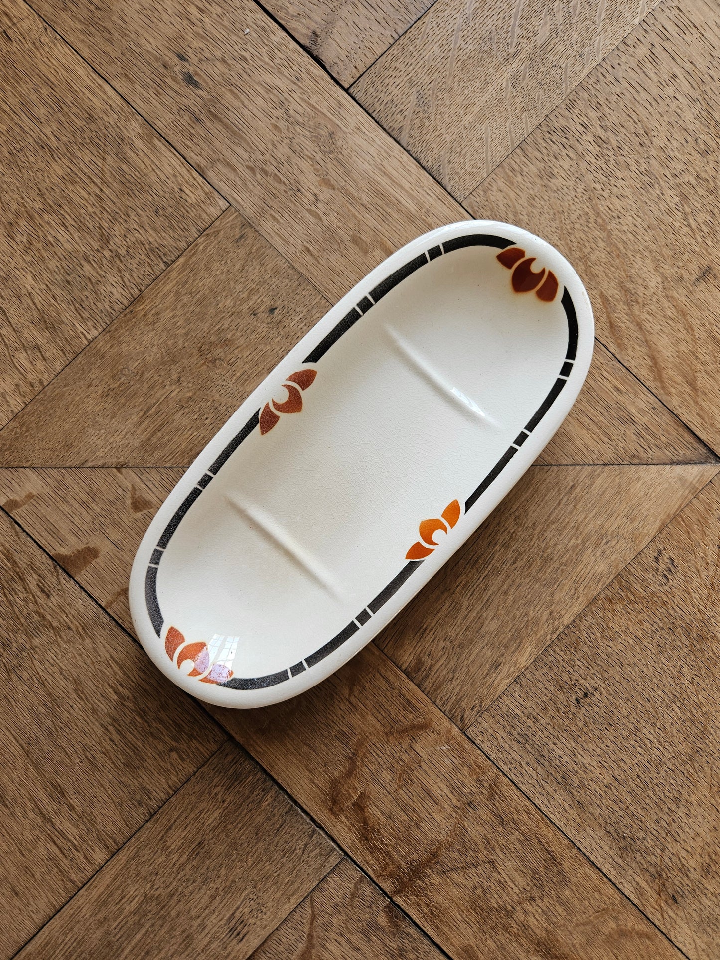 Porte savon ancien noir et orange. Style art déco 