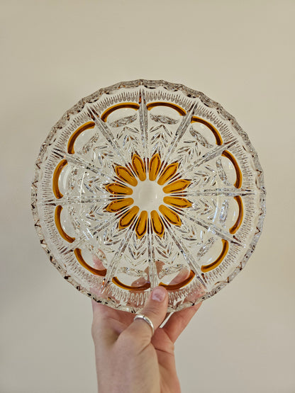 Saladier vintage en cristal. Décor central de fleur brun orangé. 