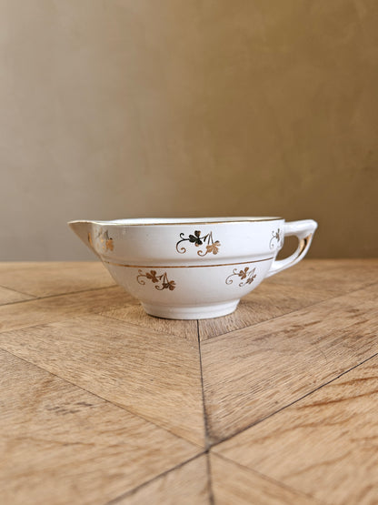 Saucière St Amand, trèfles dorés