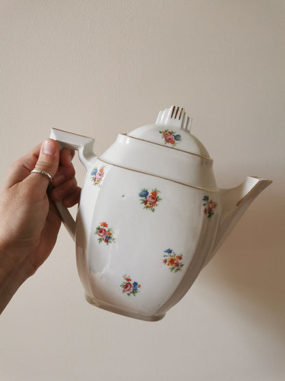 Service à thé fleuri en porcelaine
